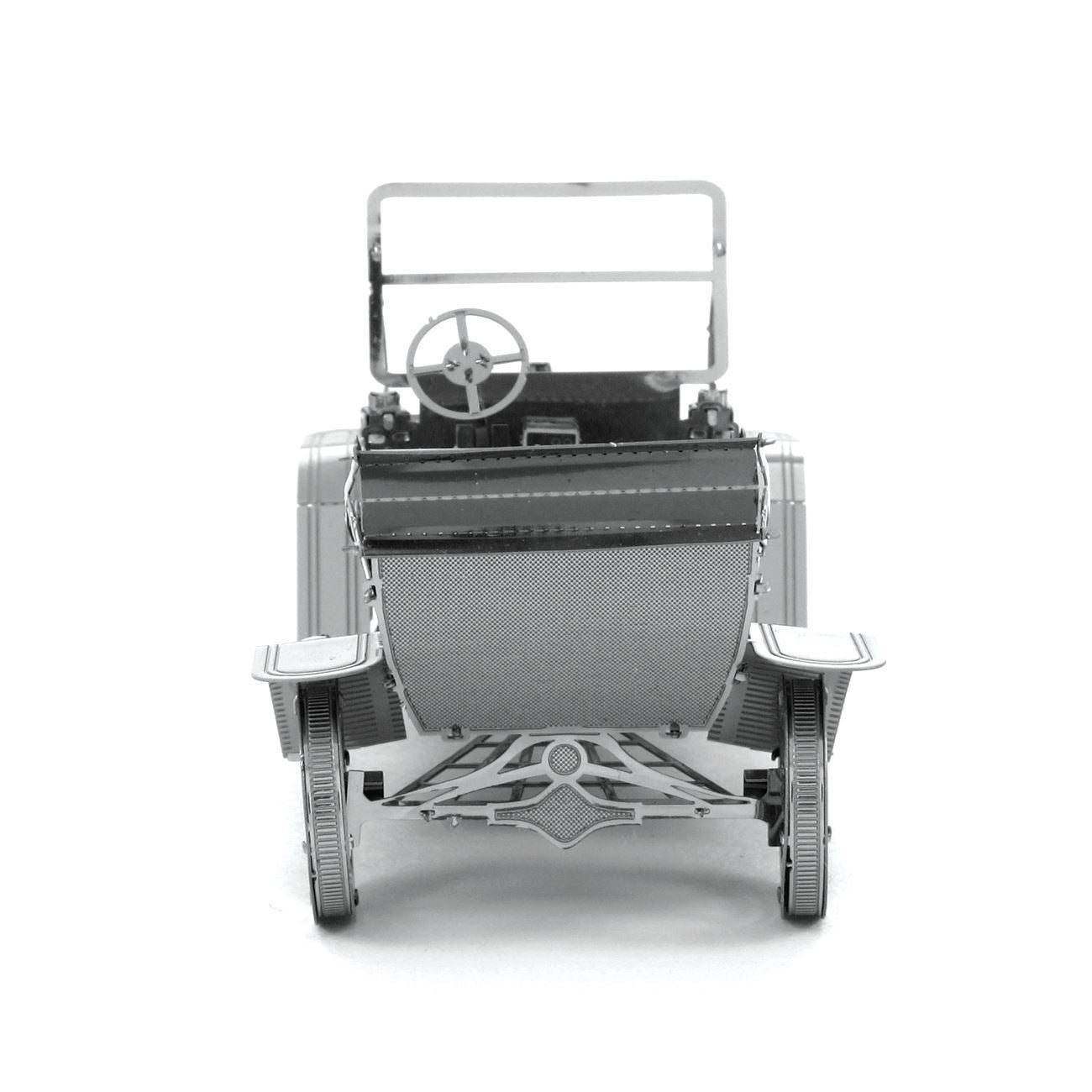 Maquette Metal Earth Ford Model T 1908 en métal argenté, vue de face arrière, montrant la structure détaillée du châssis et du siège