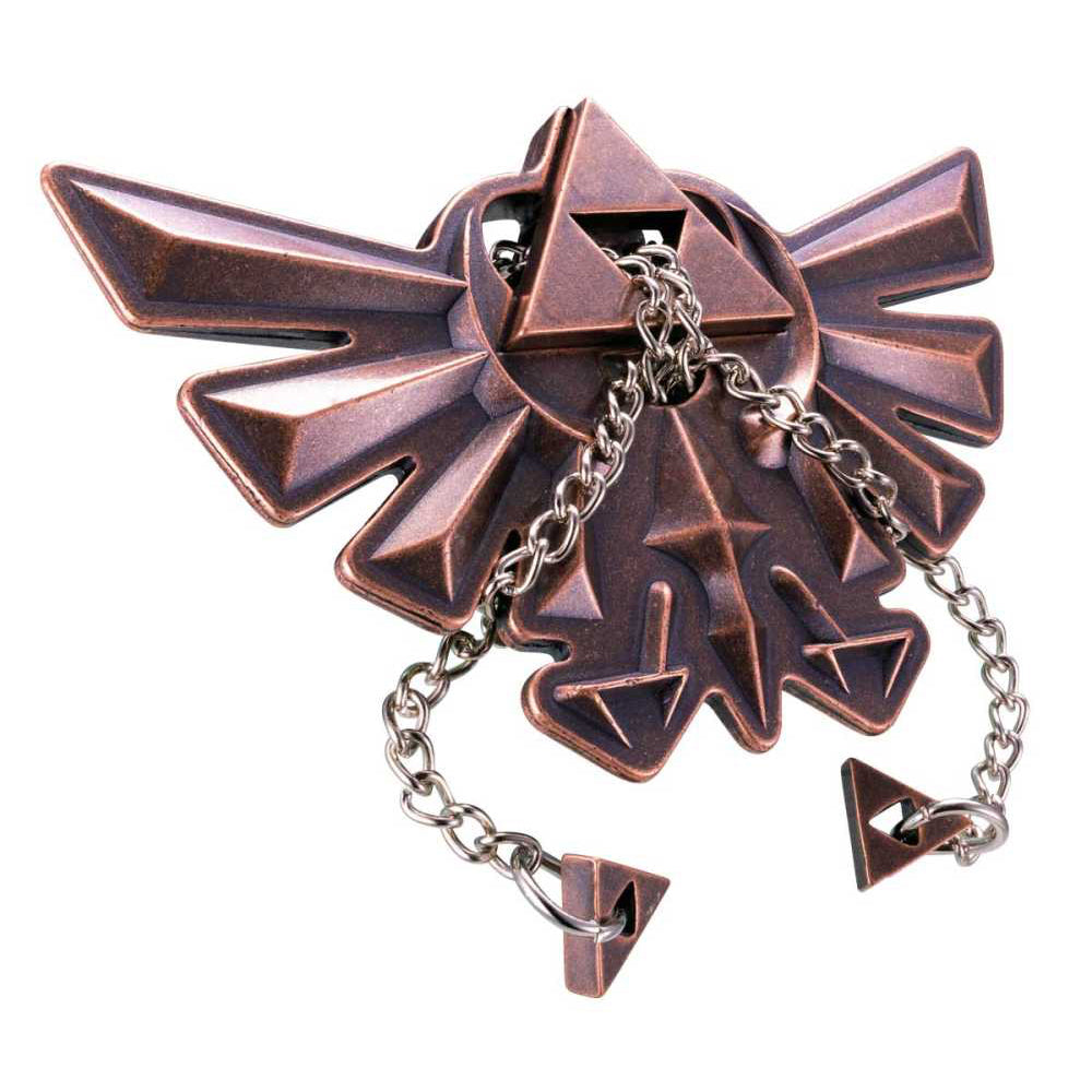 Détail des pièces métalliques du puzzle Hyrule Crest Zelda
