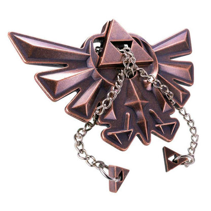 Détail des pièces métalliques du puzzle Hyrule Crest Zelda
