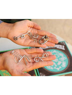 Collection de mini puzzles métalliques vert – différents mécanismes de résolution