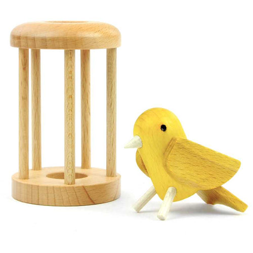 Puzzle Canary in Cage en bois démonté montrant les pièces
