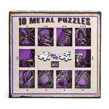 Casse-têtes métalliques Eureka Set posés sur une surface neutre
