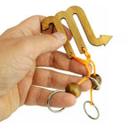 Puzzle Zodiaque Scorpion en bois démonté montrant les cordes
