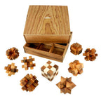 Casse-têtes en bois du Wood Set 9-en-1 posés sur une surface neutre
